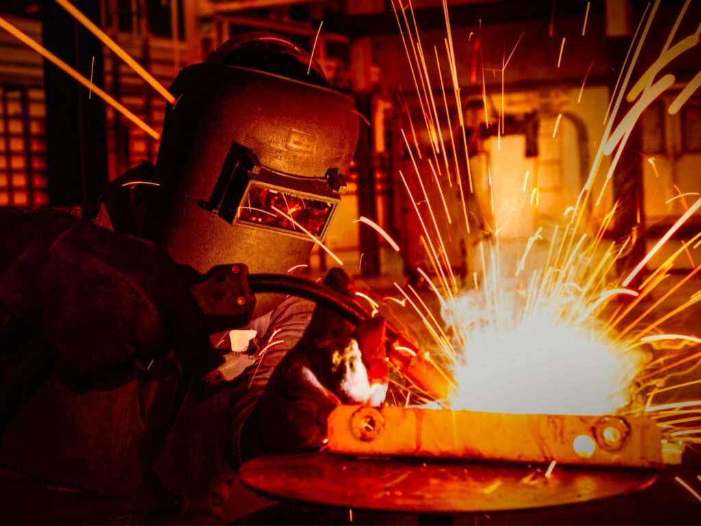 Picture of a person welding.