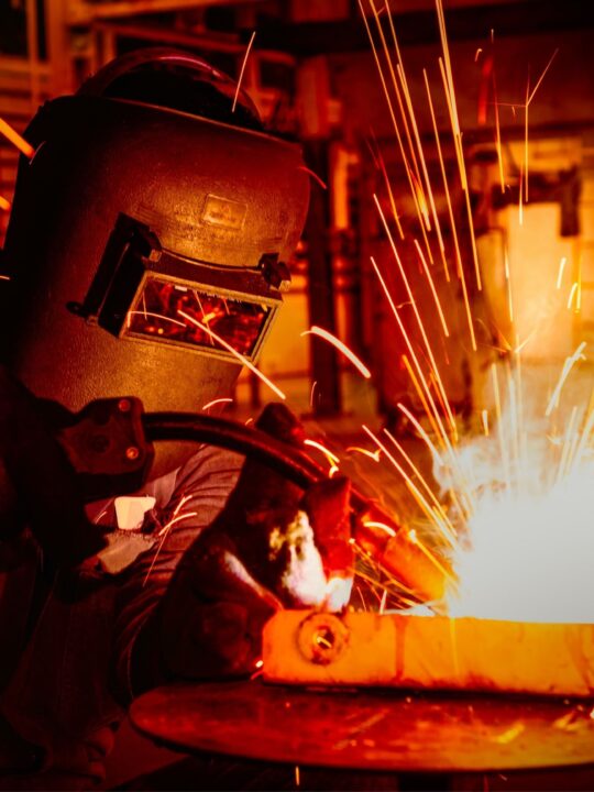 Picture of a person welding.