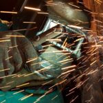 Picture of welding sparks flying.